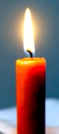 A lit orange candle