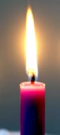A lit purple candle