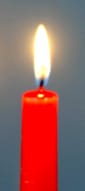 A lit red candle